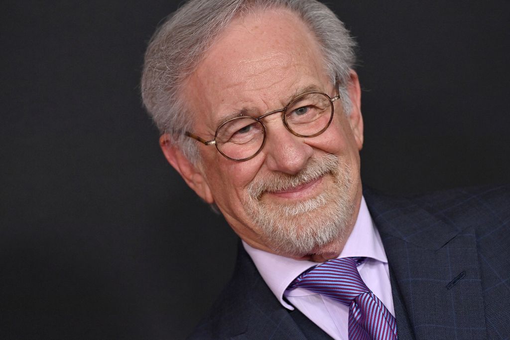 Steven Spielberg smiling at an event photo call