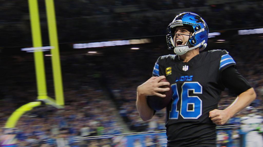 football player running with ball