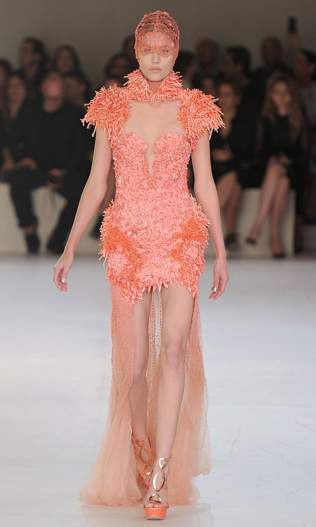 A model walks the runway at the Alexander McQueen Spring Summer 2012 fashion show during Paris Fashion Week 