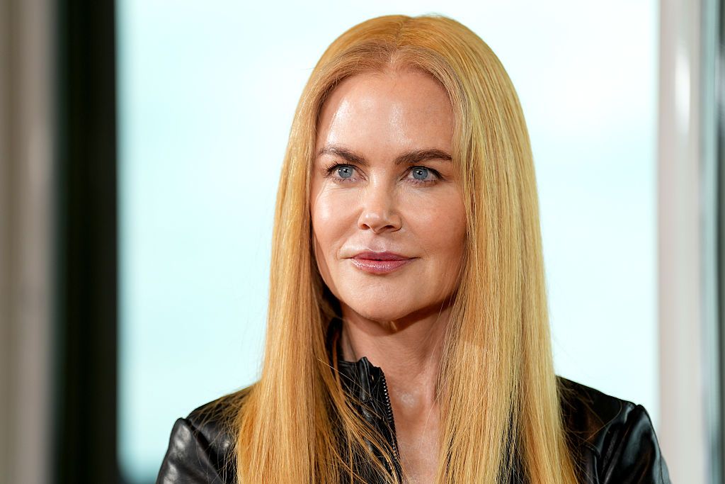 Nicole Kidman with blonde hair looking straight to camera 