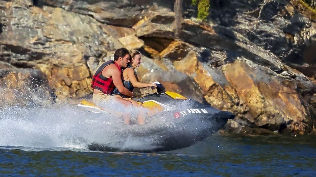 Sydney Sweeney and the mystery man shared special moments, including a thrilling rope swing jump off a cliff and a playful jet ski ride