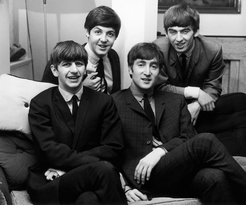 four men In suits 