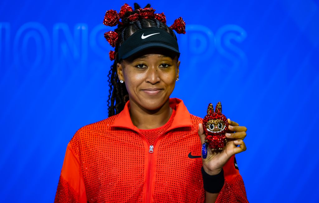 Naomi Osaka poses for a photo with her Labubu 