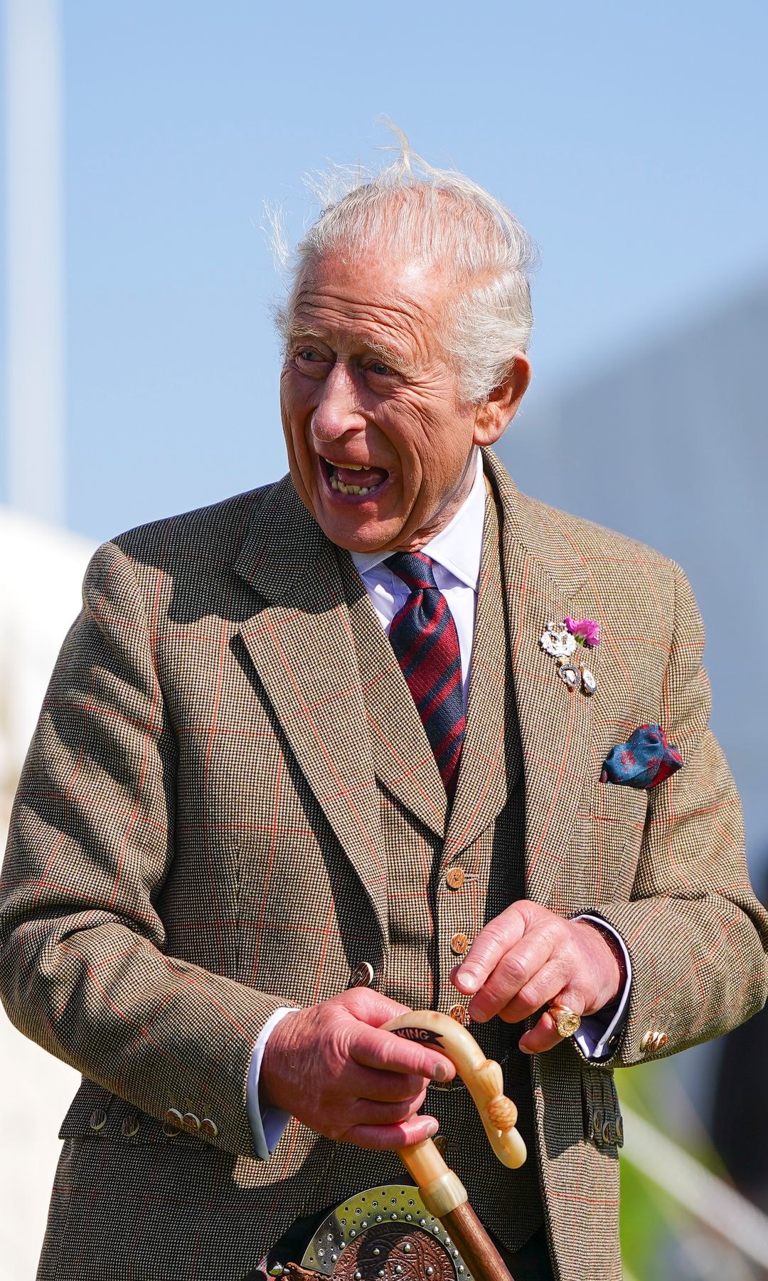 King Charles laughing