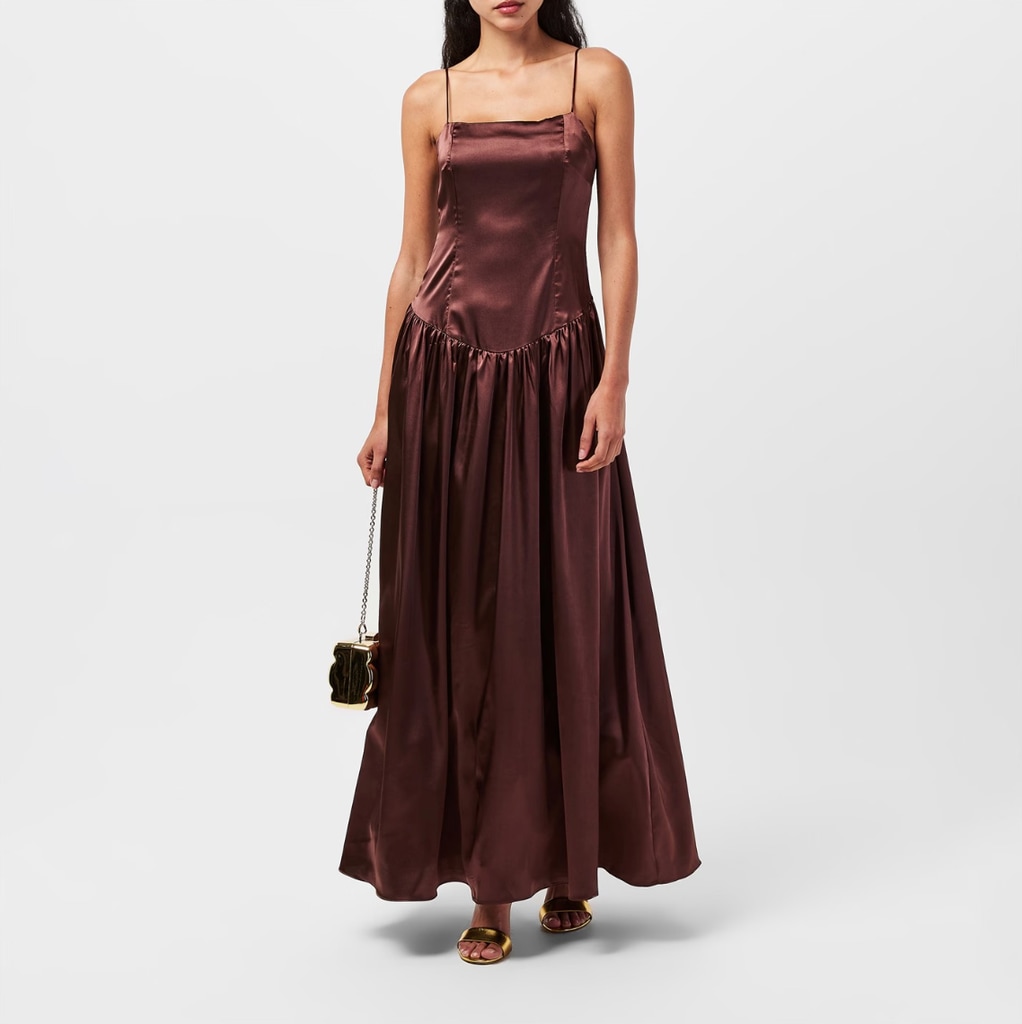 Model wearing brown satin maxi dress by AmyLynn