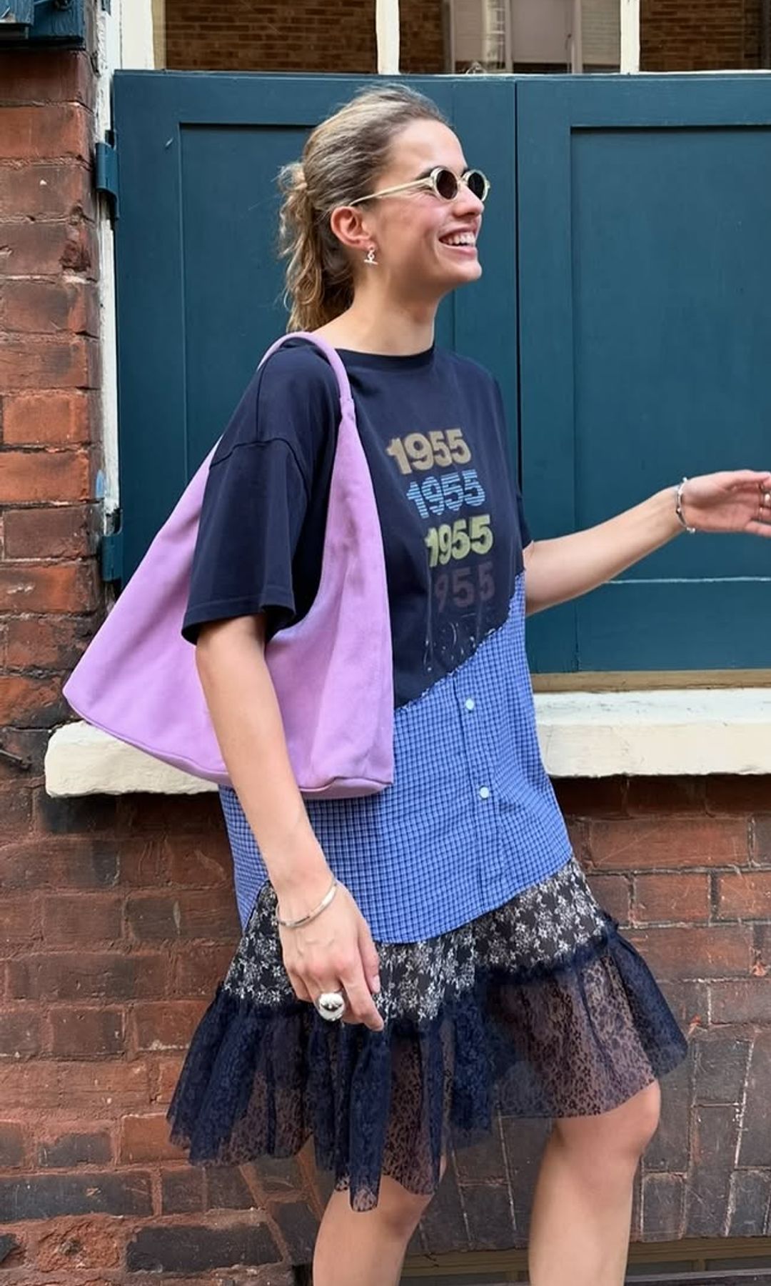 influencer in mismatched shirt dress with lace trim and lilac bag
