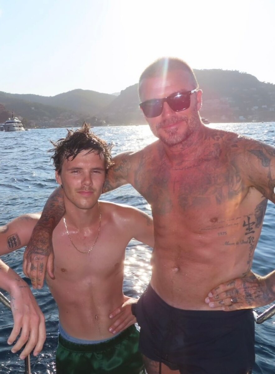 David and Cruz Beckham cool off after a swim in the Mediterranean.