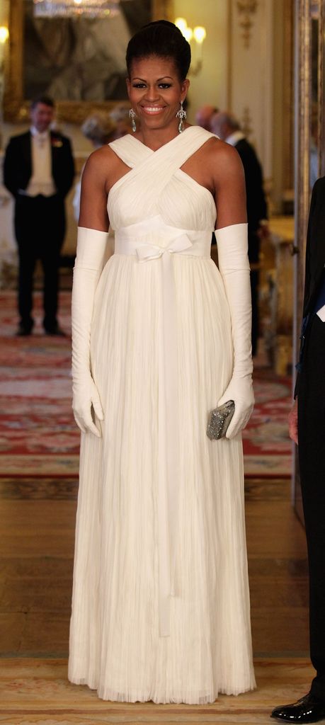 Michelle Obama poses in the Music Room of Buckingham Palace ahead of a State Banquet on May 24, 2011 in London, England. 