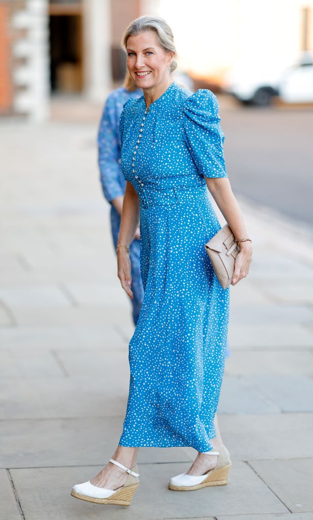 duchess sophie walking in blue polka dot dress 