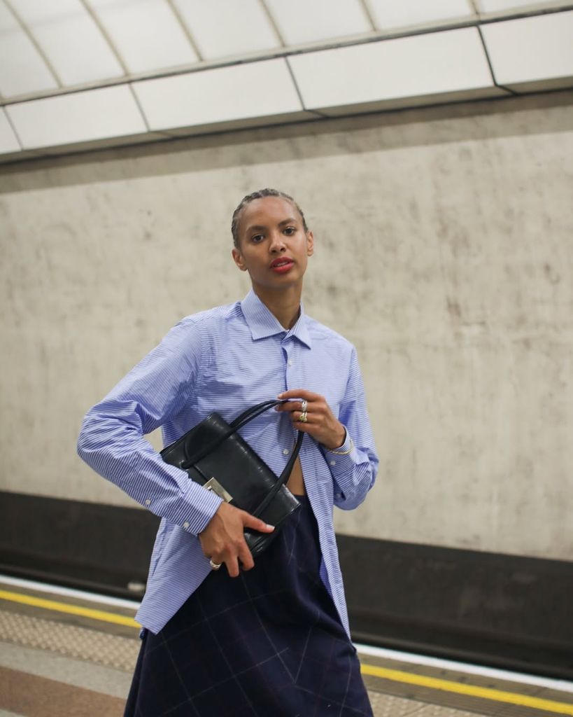 rosie oktocha poses by the tube