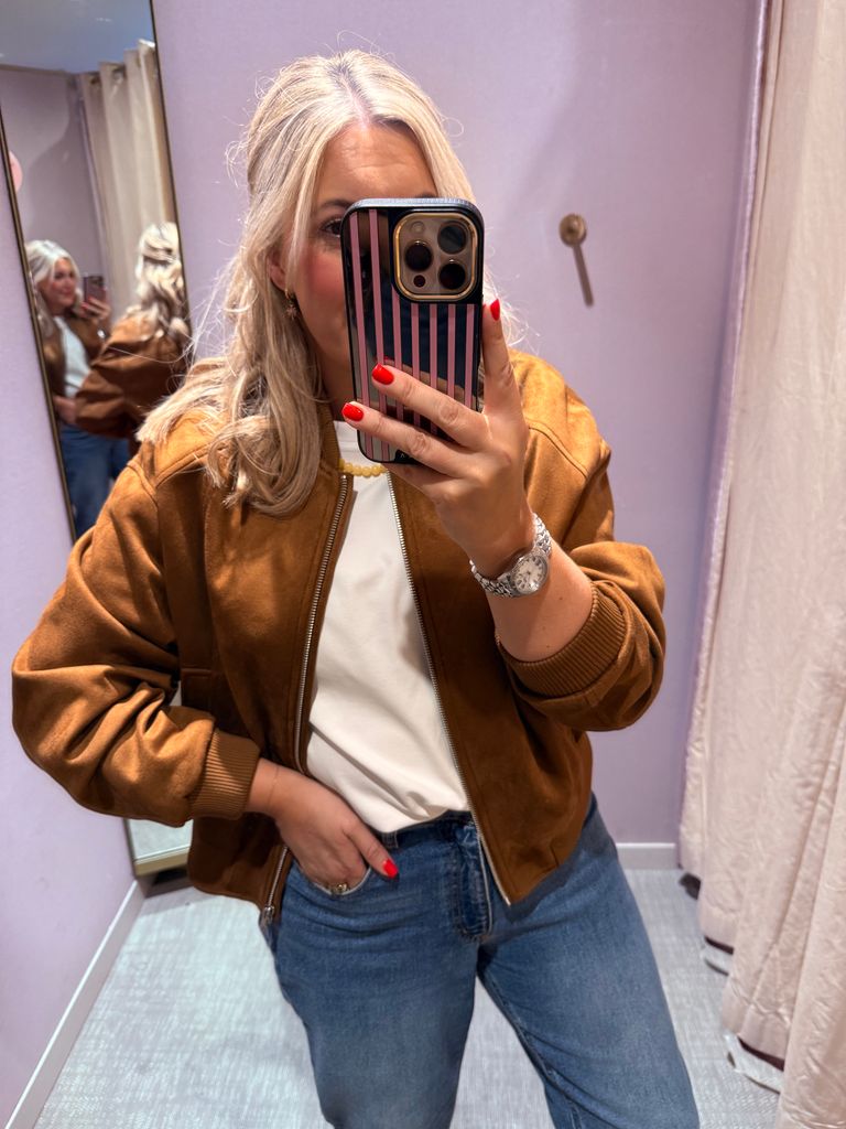 Shopping expert Leanne Bayley wearing a transitional bomber jacket from Marks & Spencer