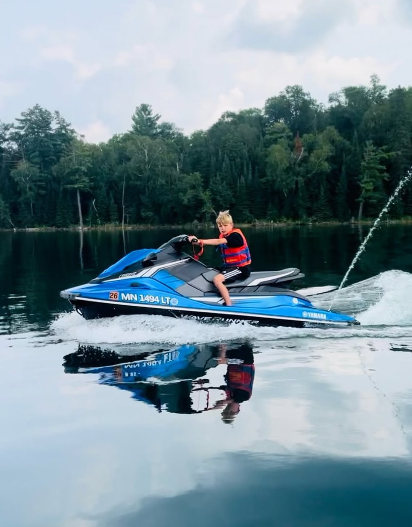 Photo of Josh Duhamel's son Axl jet skiing on their Minnesota lake