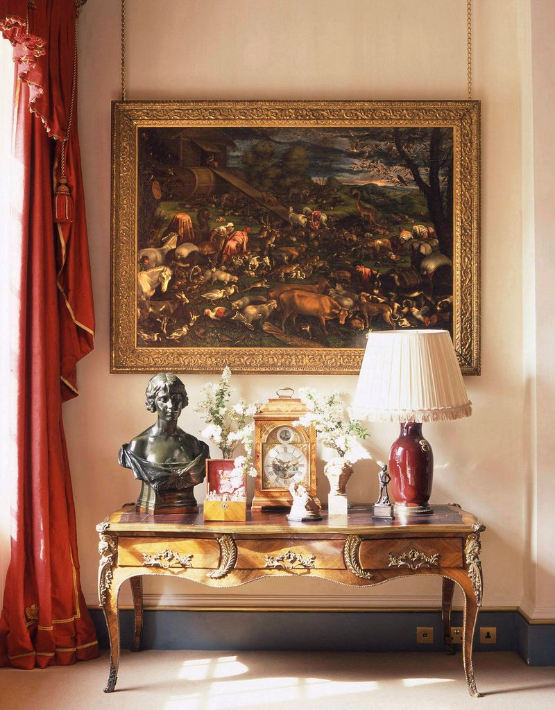 LONDON, UNITED KINGDOM - APRIL 25:  Clarence House - The Official London Residence Of Prince Charles, The Prince Of Wales. A Corner Of The Garden Room At Clarence House With Leandro Bassano Painting Of Noahs Ark And A Bust Of Queen Elizabeth The Queen Mother When Duchess Of York By Arthur Walker, On A French Writing Desk.  (Photo by Tim Graham Picture Library/Getty Images)