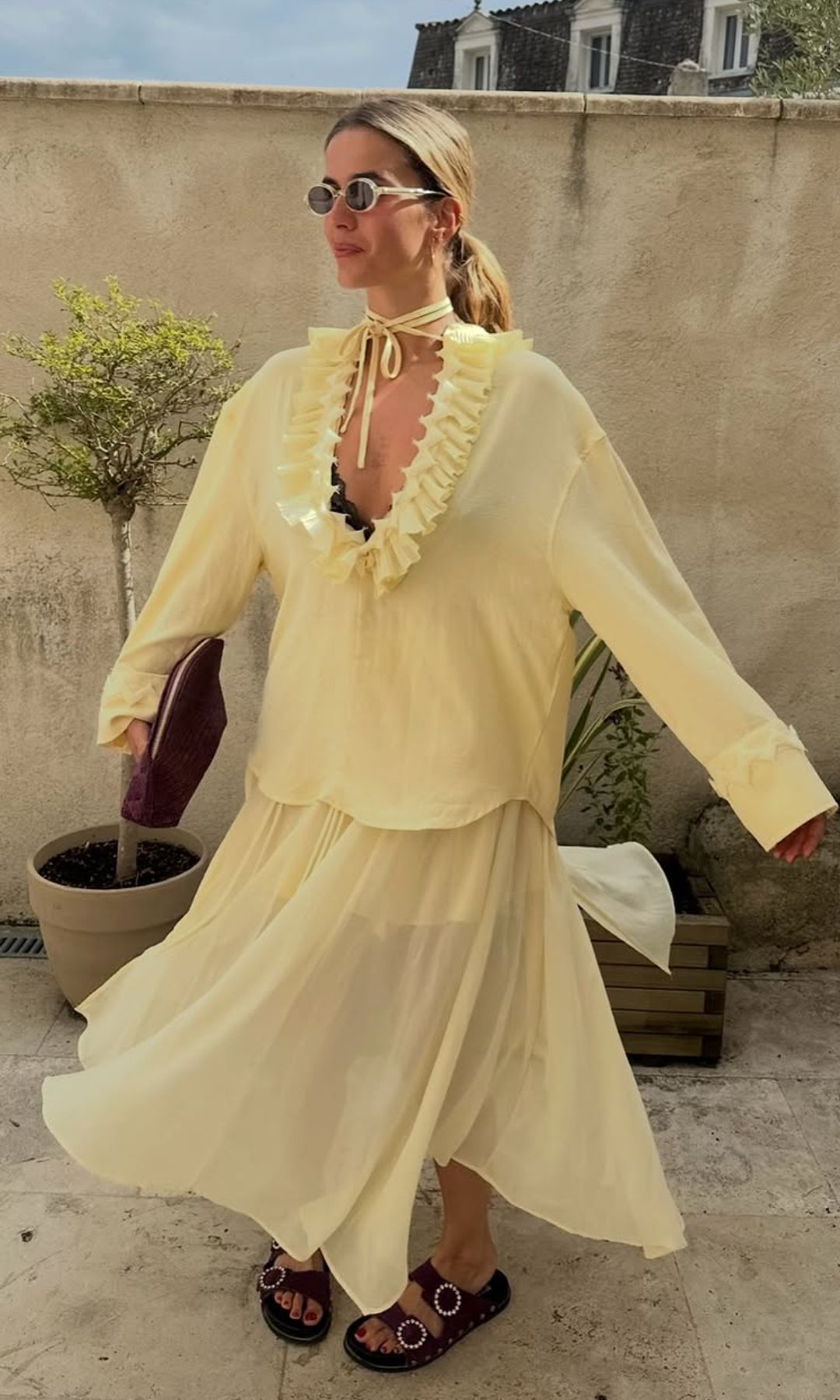 influencer wears yellow ruffled two piece