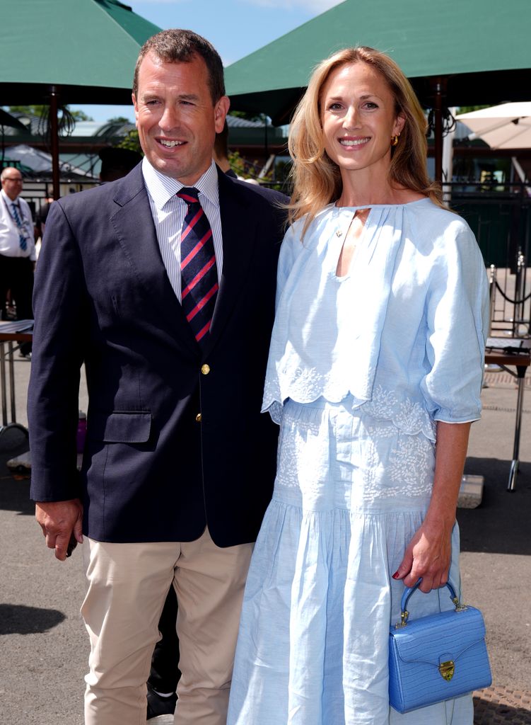Harriet Sperling at Wimbledon with Peter Phillips wearing a blue chambray outfit from Wiggy Kit and an Aspinal of London handbag