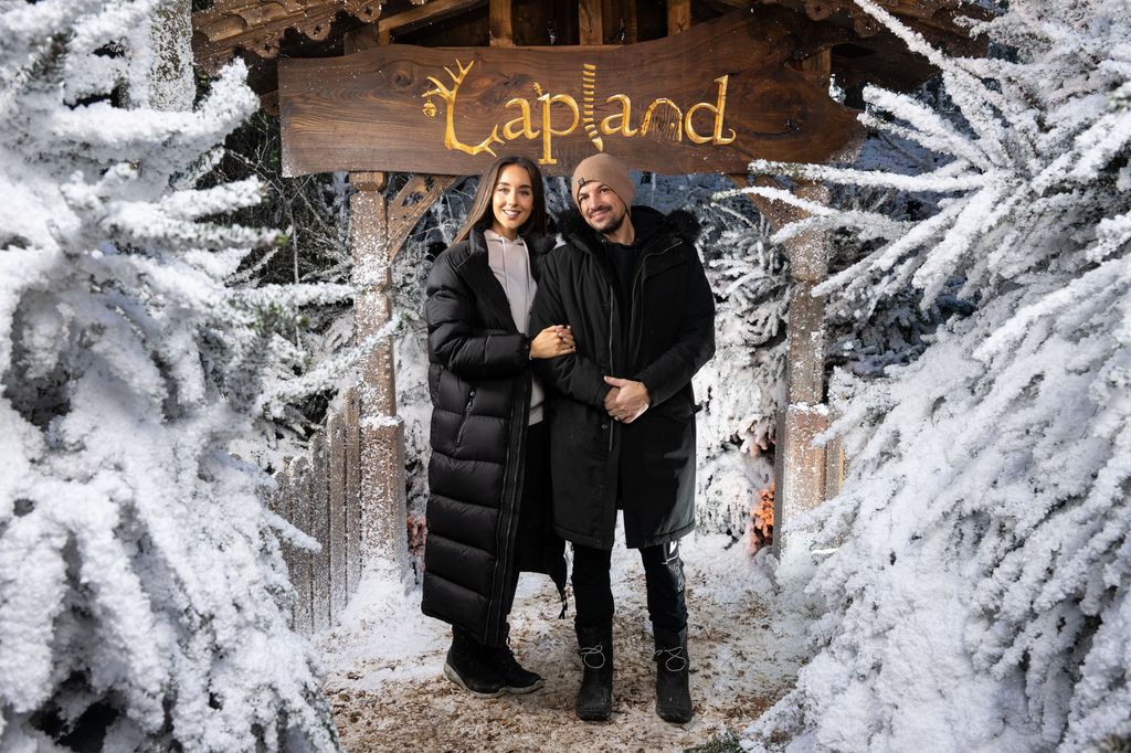 Emily MacDonagh and Peter Andre in snowy forest