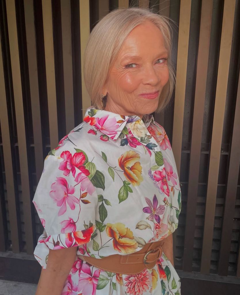 Jo Good wearing a floral dress
