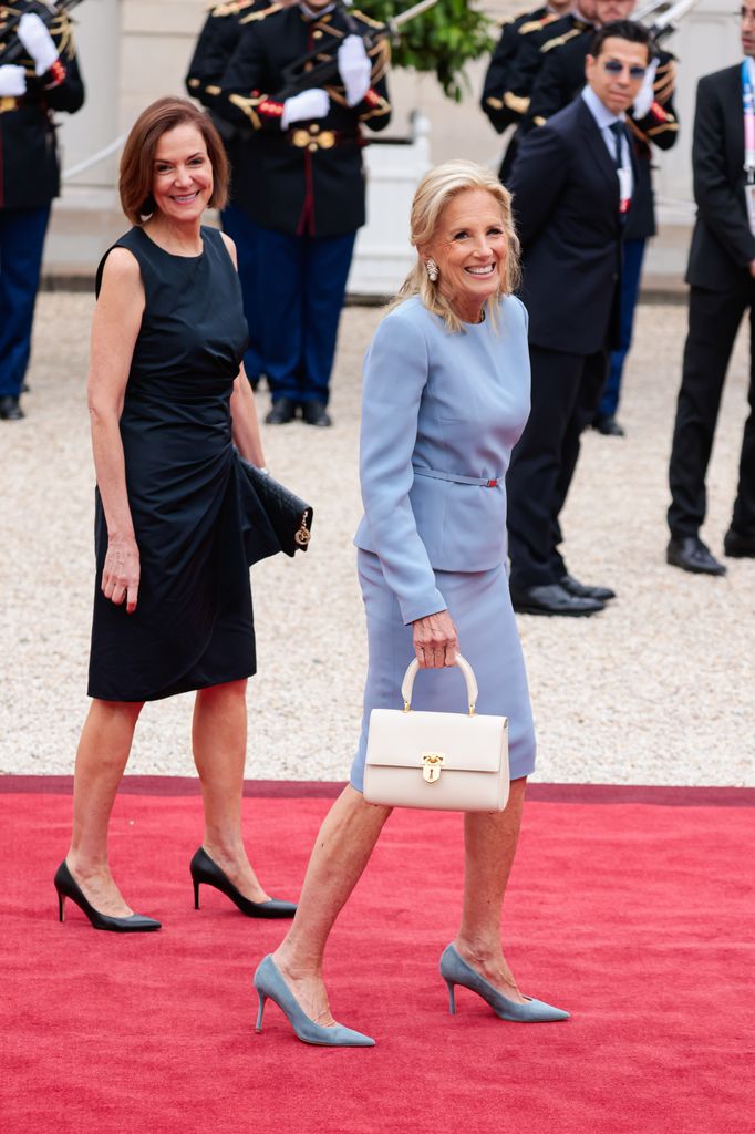 Dr. Jill Biden (R) and a guest arrive at Elysee Palace prior to the Olympics opening ceremony on July 26, 2024 in Paris, France.