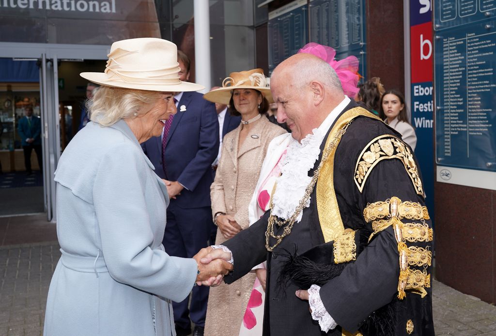 Queen Camilla shakes hands with Lord Mayor of York, Cllr Martin Rowley