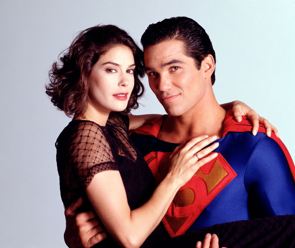 dean cain as superman holding teri hatcher as lois lane