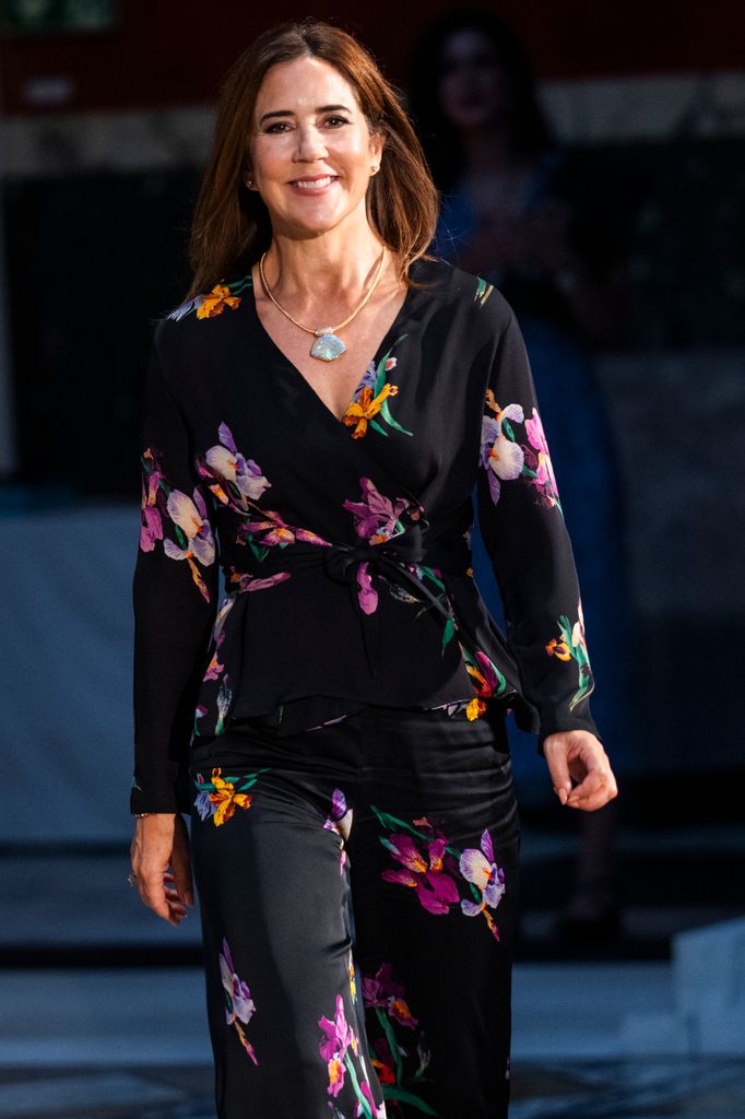Queen Mary smiling in floral coord 