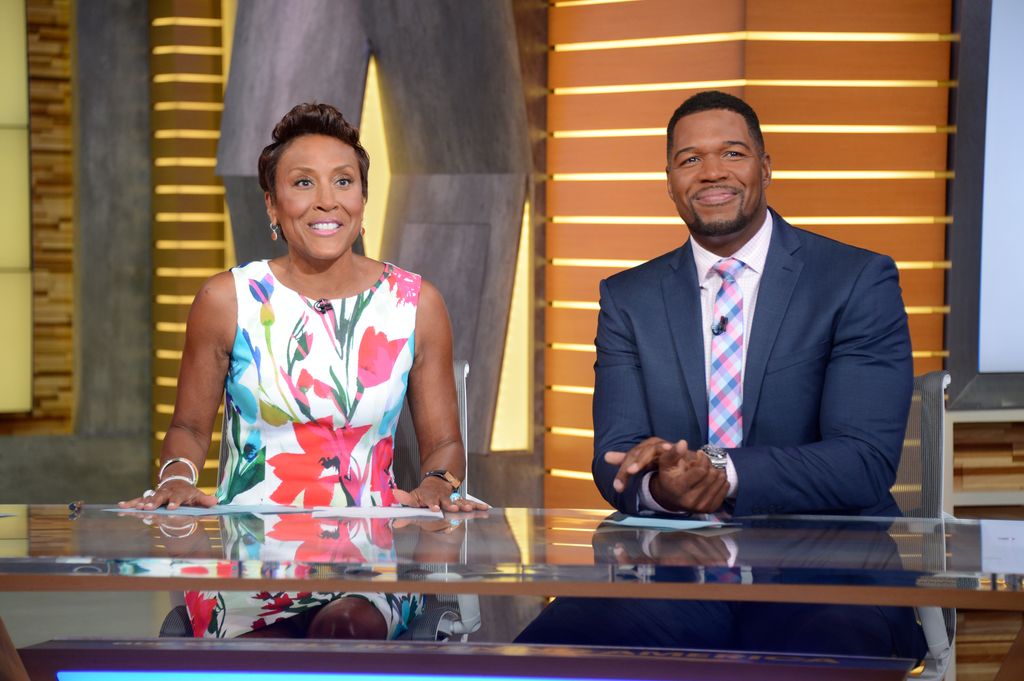 photo of michael strahan and robin roberts sitting at gma desk