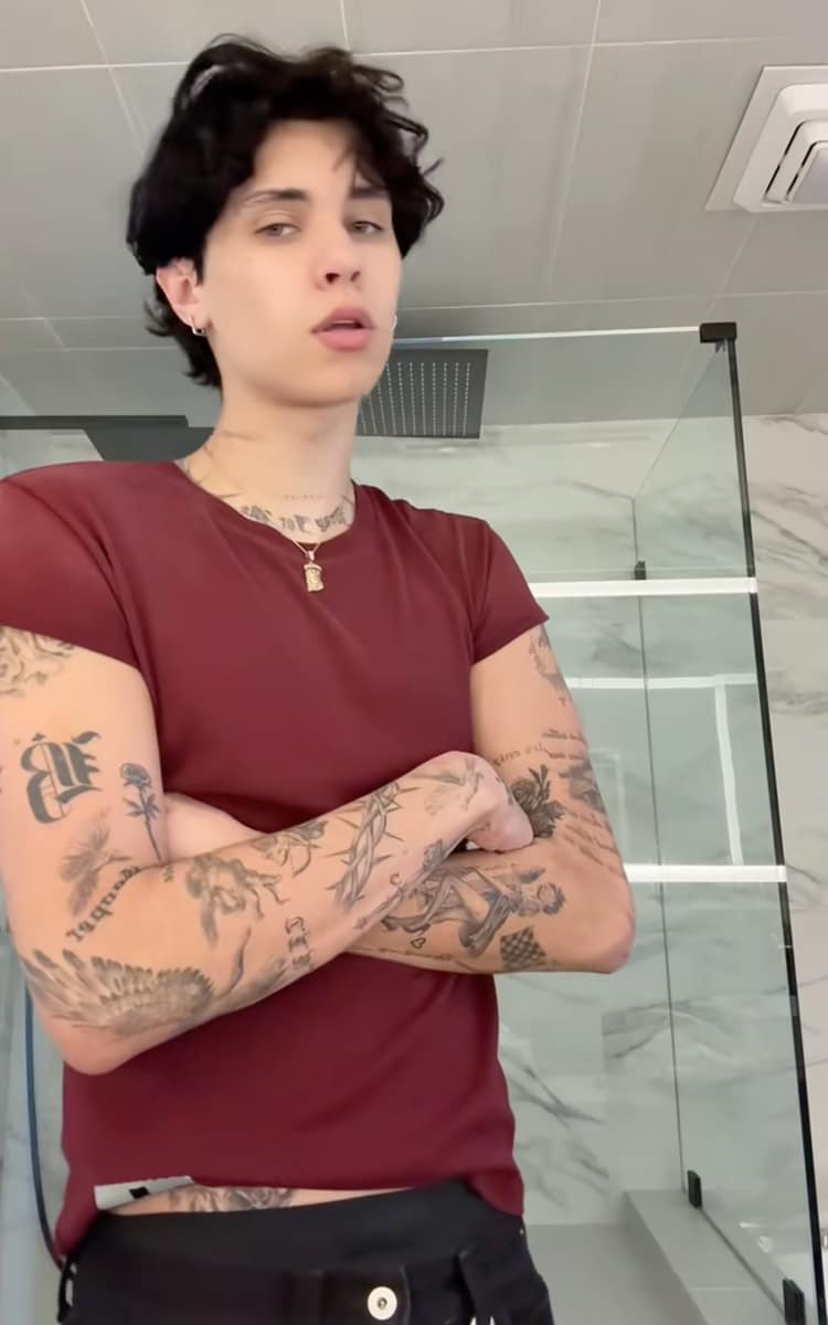 The lover boy added text over the eye tattoo