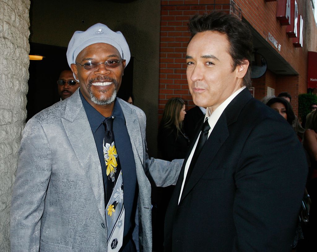 WESTWOOD, CA - JUNE 12: Actors Samuel L. Jackson (L) and John Cusack arrive to the premiere of MGM and Dimension Films' "1408" held at Mann National Theatre on June 12, 2007 in Westwood, California. (Photo by Kevin Winter/Getty Images)