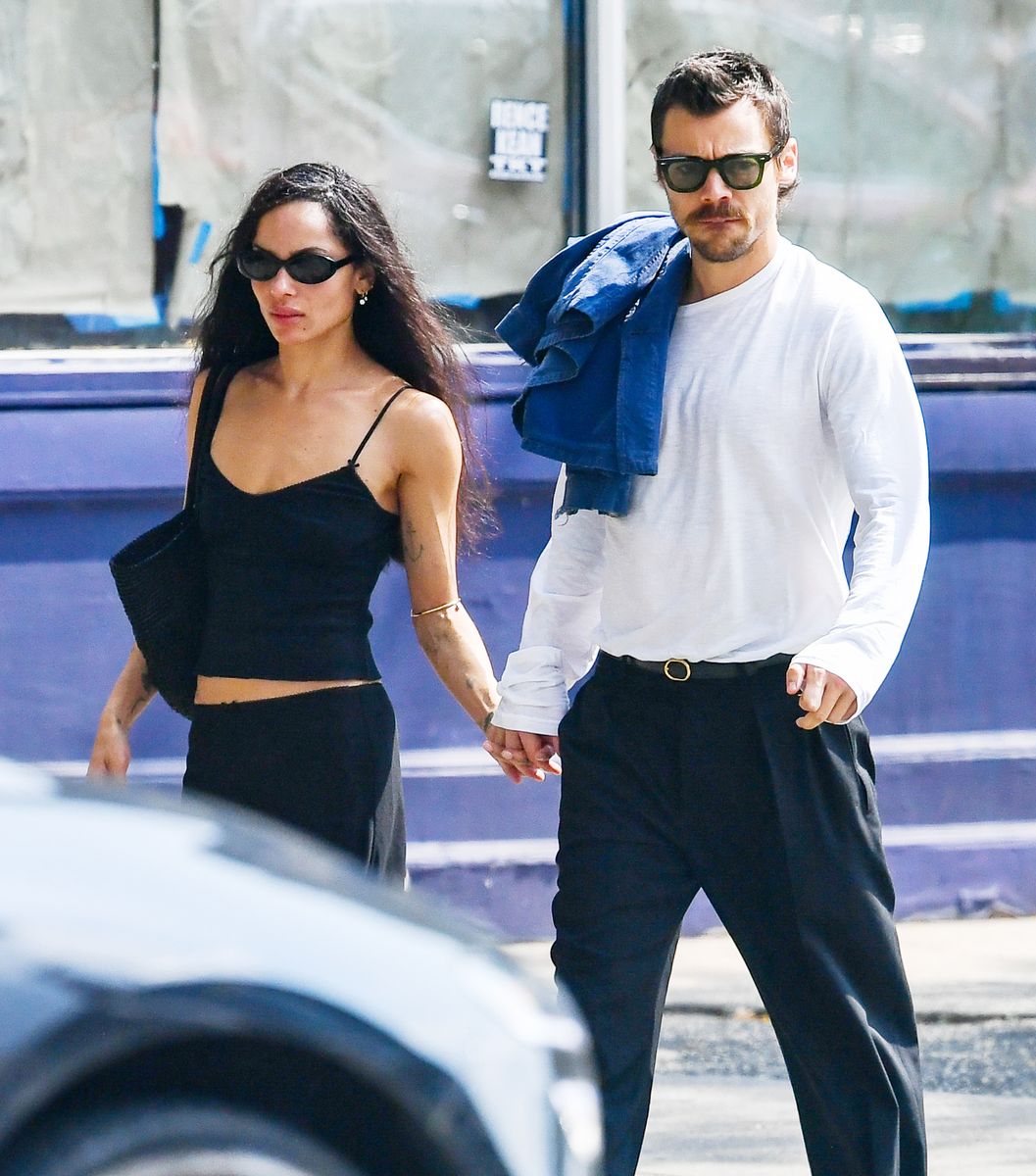 Harry Styles and Zoë Kravitz meet up with Lenny Kravitz in New York City. The inseparable new couple held hands as they made their way to celebrity hot spot Sant Ambroeus in the West Village to join Zoe's legendary rocker father. 