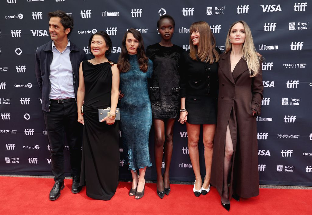 Charles Gillibert, Zhang Xin, Ella Rumpf, Anyier Anei, Alice Winocour, and Angelina Jolie attend the premiere of "Couture" during the 2025 Toronto International Film Festival at Princess of Wales Theatre on September 07, 2025 in Toronto, Ontario.