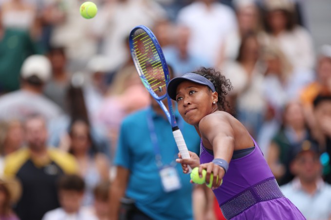 Naomi Osaka serving at the 2025 US Open