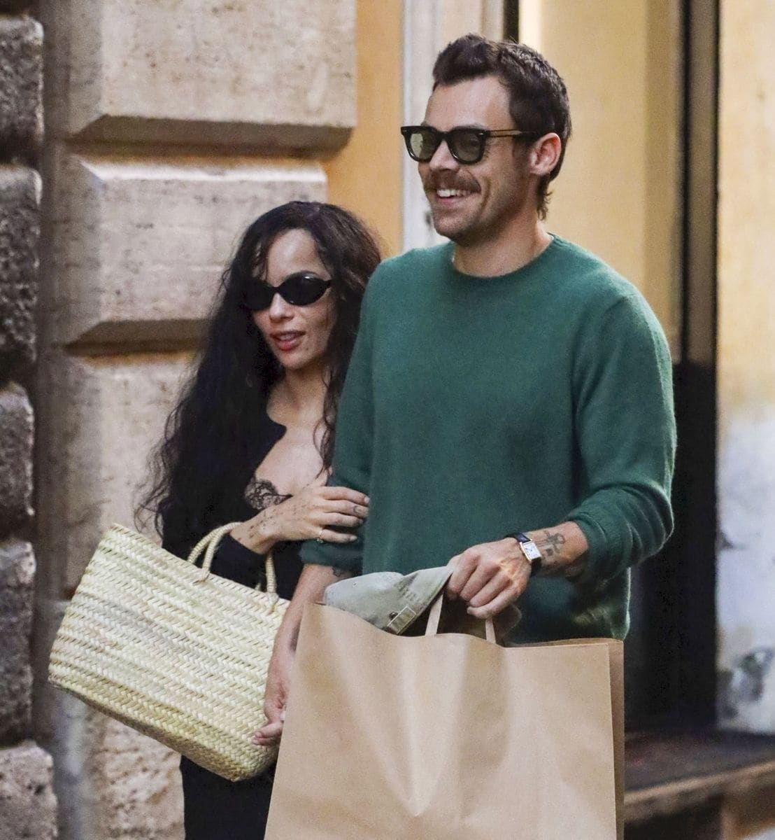 Harry Styles is all smiles with girlfriend Zoe Kravitz on his arm spotted out on an evening stroll through the streets of Rome, Italy.
