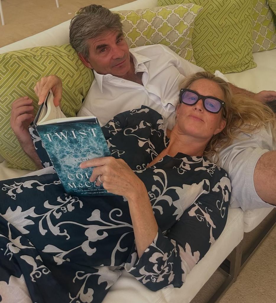 George stephanopoulos and ali wentworth lying on the couch 
