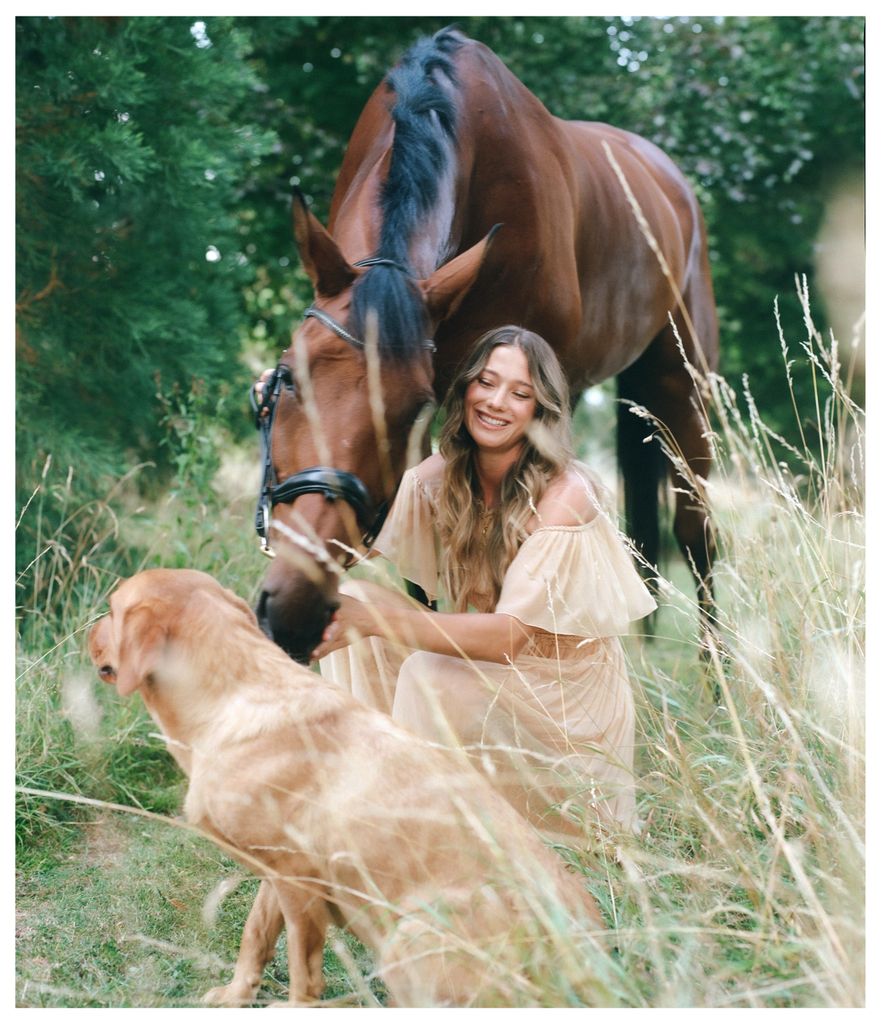 Jemima relaxes with her beloved horse Malv and dog