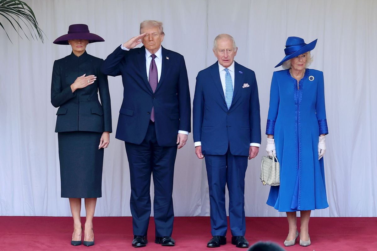 Melania opted for a classical outfit, adding a dash of color with her hat