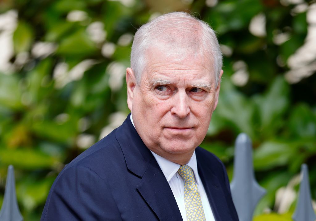 Prince Andrew looking to right in suit