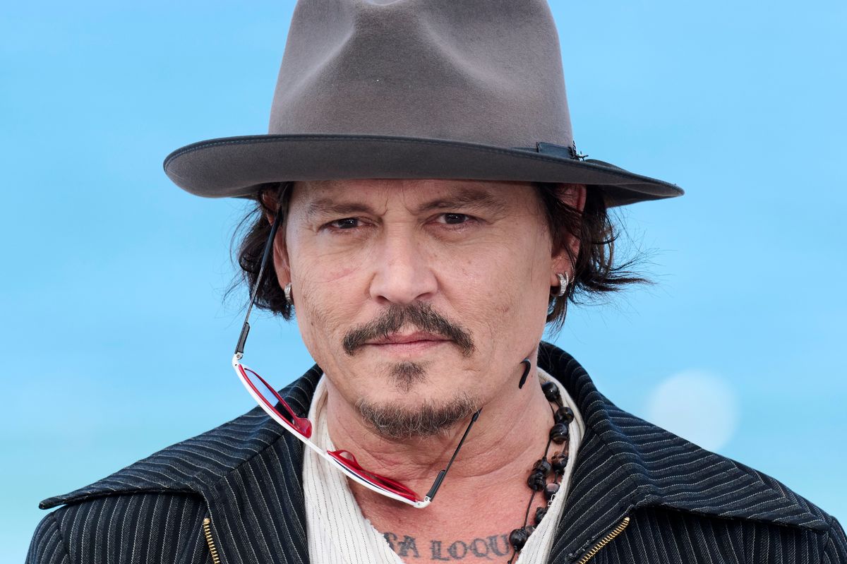 SAN SEBASTIAN, SPAIN - SEPTEMBER 24: Director Johnny Depp attends the 'Modi, Three Days On The Wing Of Madness' photocall during the 72nd San Sebastian International Film Festival at the Kursaal Palace on September 24, 2024 in San Sebastian, Spain. (Photo by Carlos Alvarez/Getty Images)