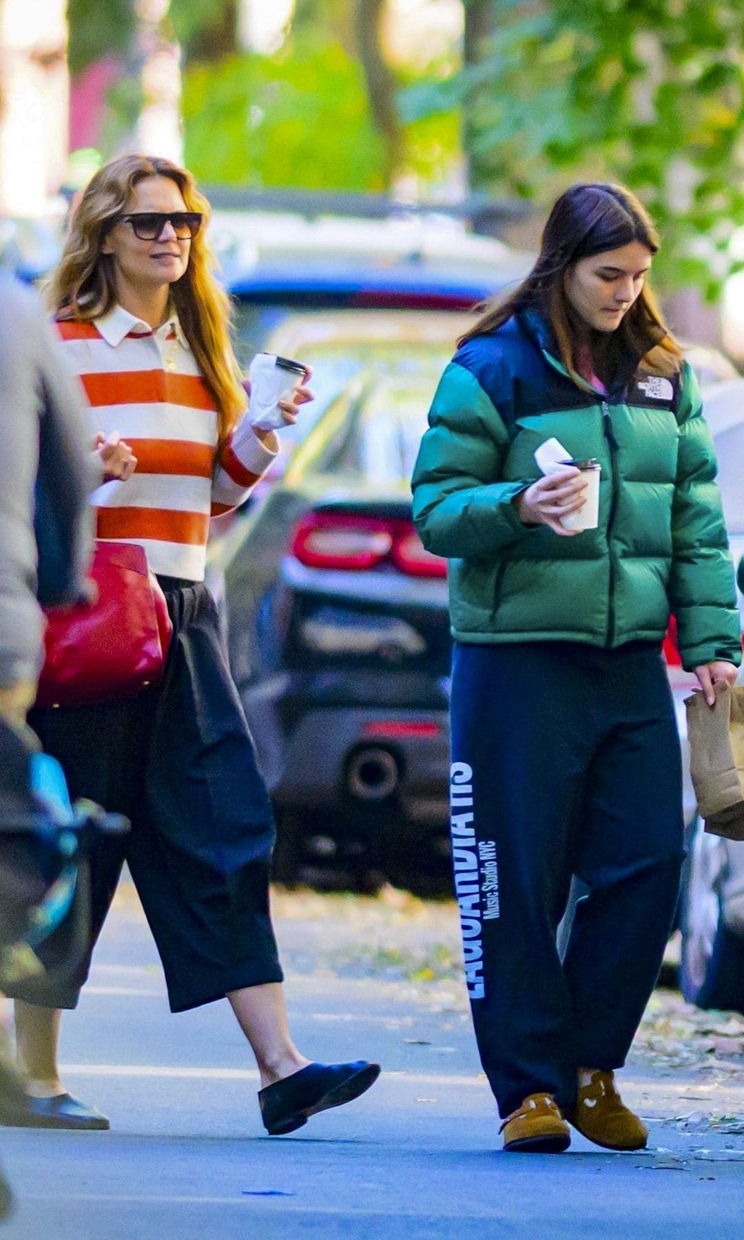 Suri and Katie dressed appropriately for the cold weather