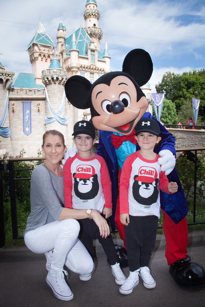 ANAHEIM, CA - OCTOBER 14:  In this handout image provided by Disneyland Resort, Celine Dion and twin sons Eddy (L) and Nelson, age 4, celebrate the boys' upcoming fifth birthday with Mickey Mouse at Disneyland park in Anaheim, Calif. on Wed. The Disneyland Resort Diamond Celebration celebrates 60 years of magic now through September 5, 2016. (Photo by Scott Brinegar/Disneyland Resort via Getty Images)