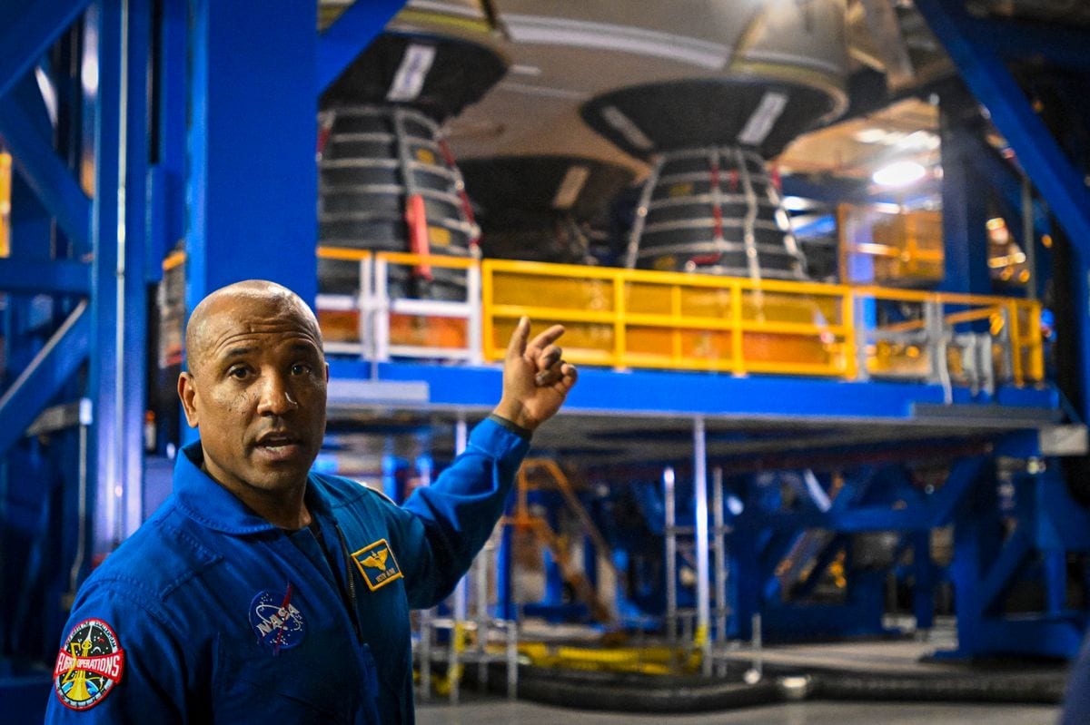 NASA astronaut and Artemis II pilot, Victor Glover, speaks to the press during an Artemis Media event in the Vehicle Assembly Building at Kennedy Space Center