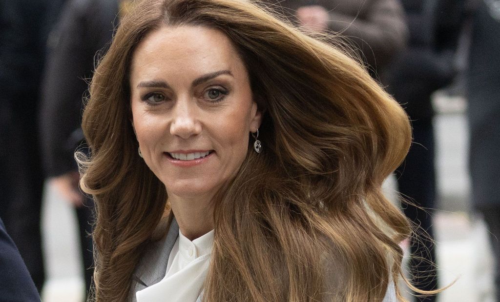 Princess of Wales with hair billowing in wind
