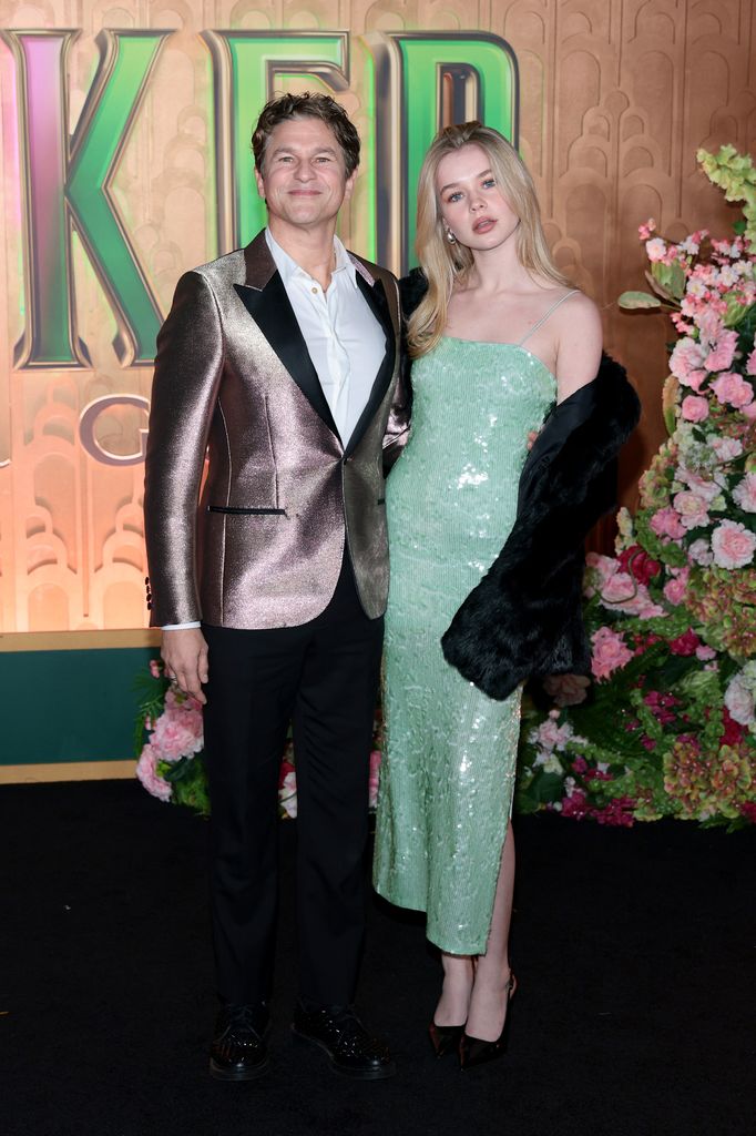 photo of david burtka and daughter harper in green sequinned dress