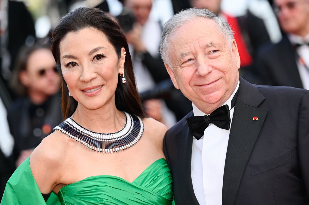 Michelle Yeoh and Jean Todt attend the "Firebrand (Le Jeu De La Reine)" red carpet during the 76th annual Cannes film festival at Palais des Festivals on May 21, 2023 in Cannes, France.