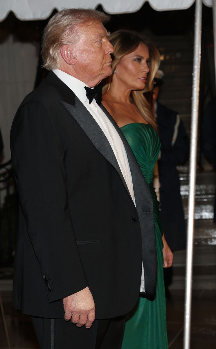 Complementing the gown, Melania opted for understated yet elegant accessories.