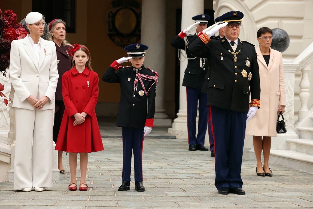 Prince Albert and Prince Jacques salute during the military parade
