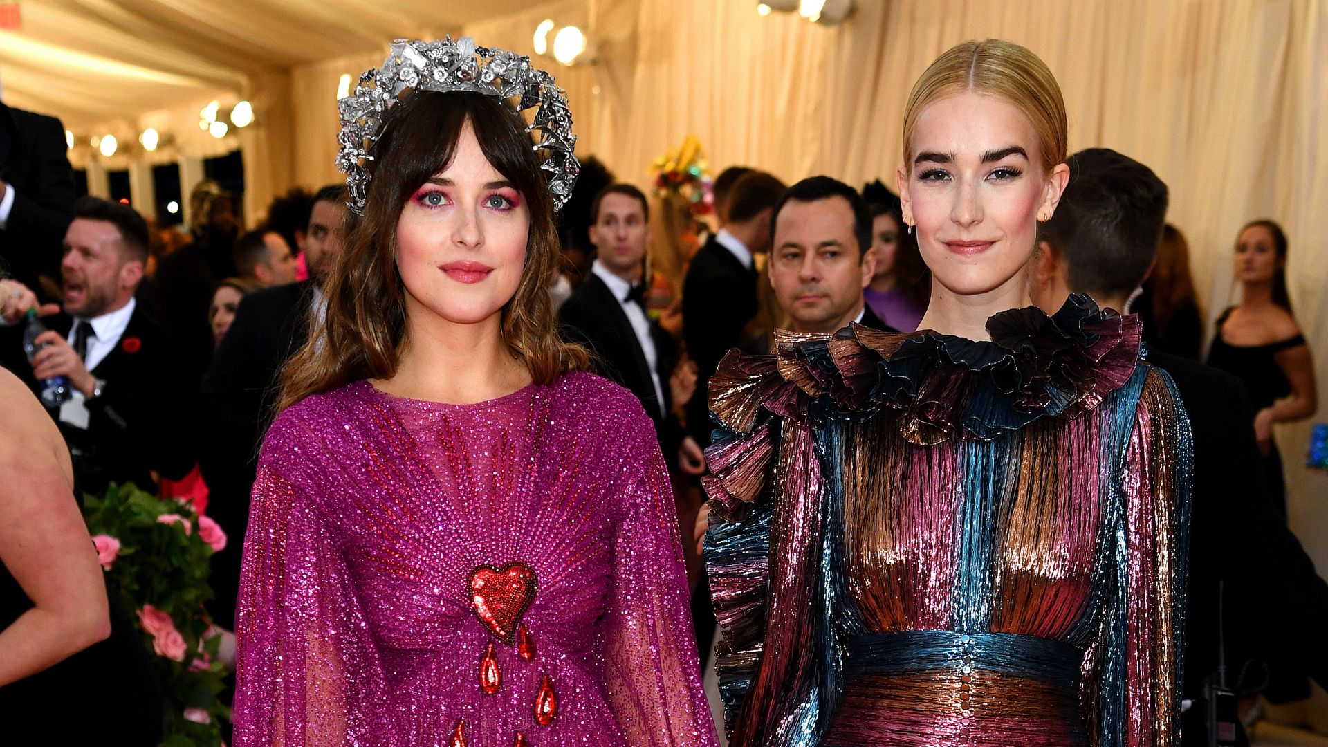 photo of dakota johnson and grace johnson at met gala 2019