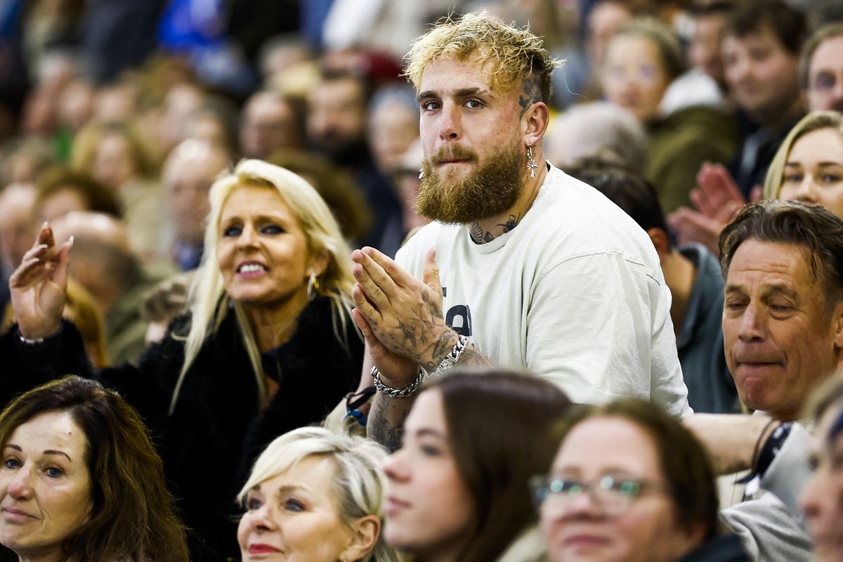 US professional boxer Jake Paul applauds as he encourages his partner Dutch speed skater Jutta Leerdam competing in the 500m sprint during the second day of the Dutch sprint speed skating championships in Thialf, in Heerenveen, on December 29, 2024. (Photo by Vincent Jannink / ANP / AFP) / Netherlands OUT (Photo by VINCENT JANNINK/ANP/AFP via Getty Images)