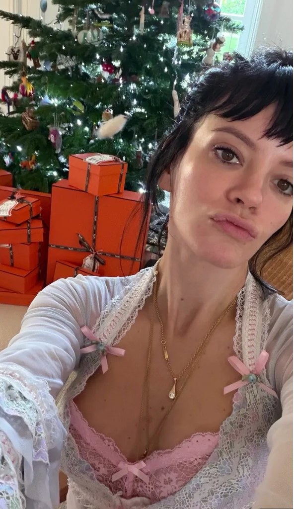 Lily Allen in a pink lace bra