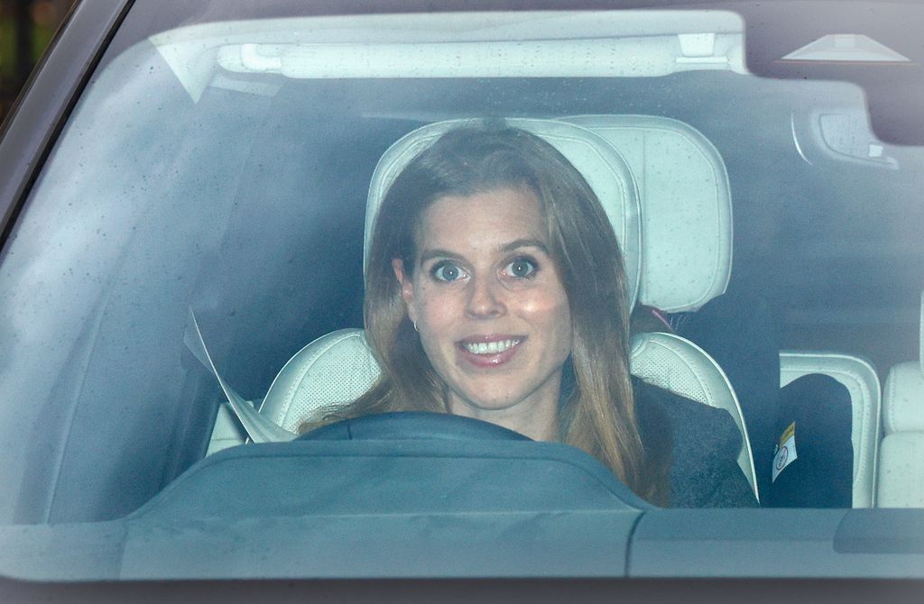 Princess Beatrice was all smilrs behind the driver's seat