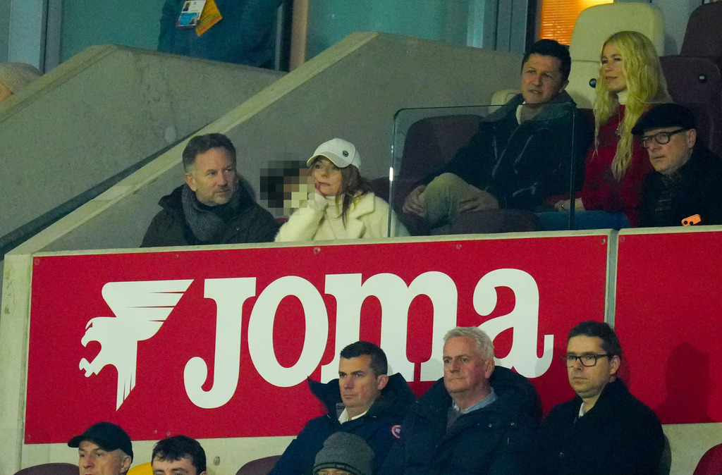 Geri Halliwell-Horner and Christian Horner at the football game with Olivia